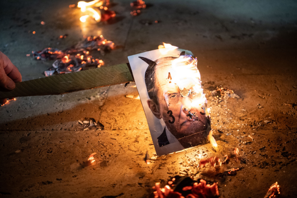Burning photo of lavrov